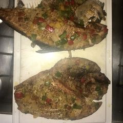 A picture of Oven-roasted Fish with Peppers.