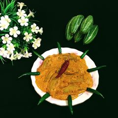 A picture of Doi Patol /Pointed Gourd in Curd Gravy.