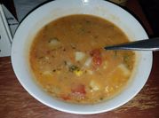 A picture of chicken potato and bell pepper