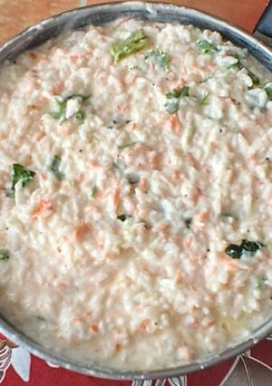 A picture of Carrot curd rice.