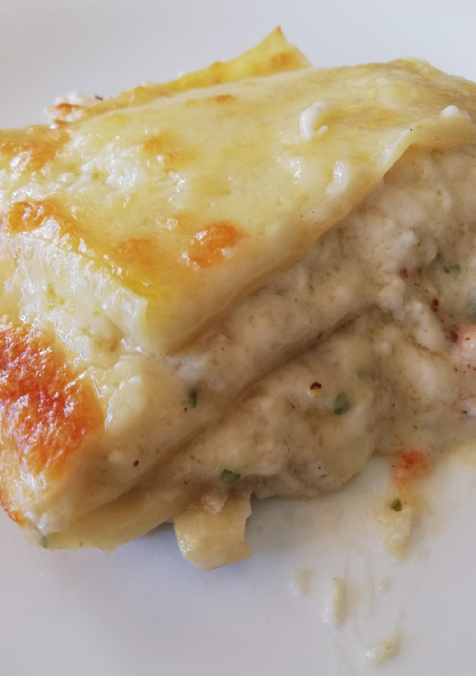 Una foto de Lasaña de bacalao y gambas 🦐