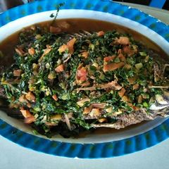 Fried fish with sukuma wiki A picture of Fried fish with sukuma wiki.