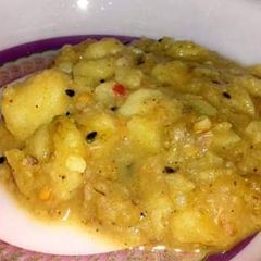 Aalu ki tarkari with kachori A picture of Aalu ki tarkari with kachori.