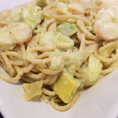 A picture of Spaghetti with creamy avocado and prawns.