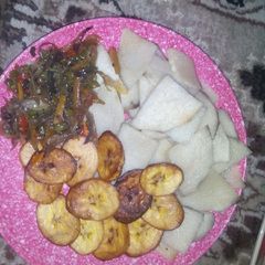 A picture of Fried yam,vegetable sauce and plantain.