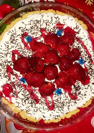 O poză a rețetei Tartă cu cremă de cheescake și căpșiuni.