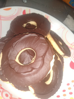 Una foto de Galletitas bañadas en chocolate 🍫😍