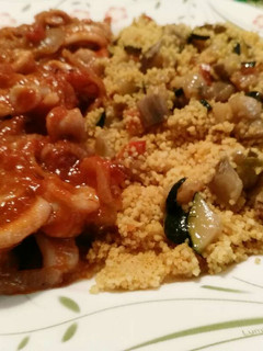 Una foto de Calamares con cous cous