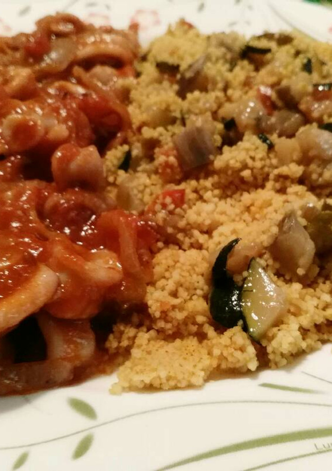 Una foto de Calamares con cous cous
