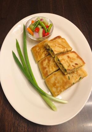 A picture of Easy Homemade Savory Folded Pancake with Ground Turkey and Eggs Filling (Martabak Telur).