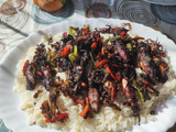 Chipirones en su tinta con arroz
