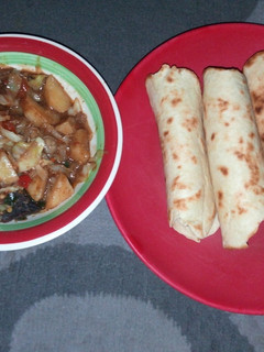 A picture of Roti with cabbage nd potatoe soup.
