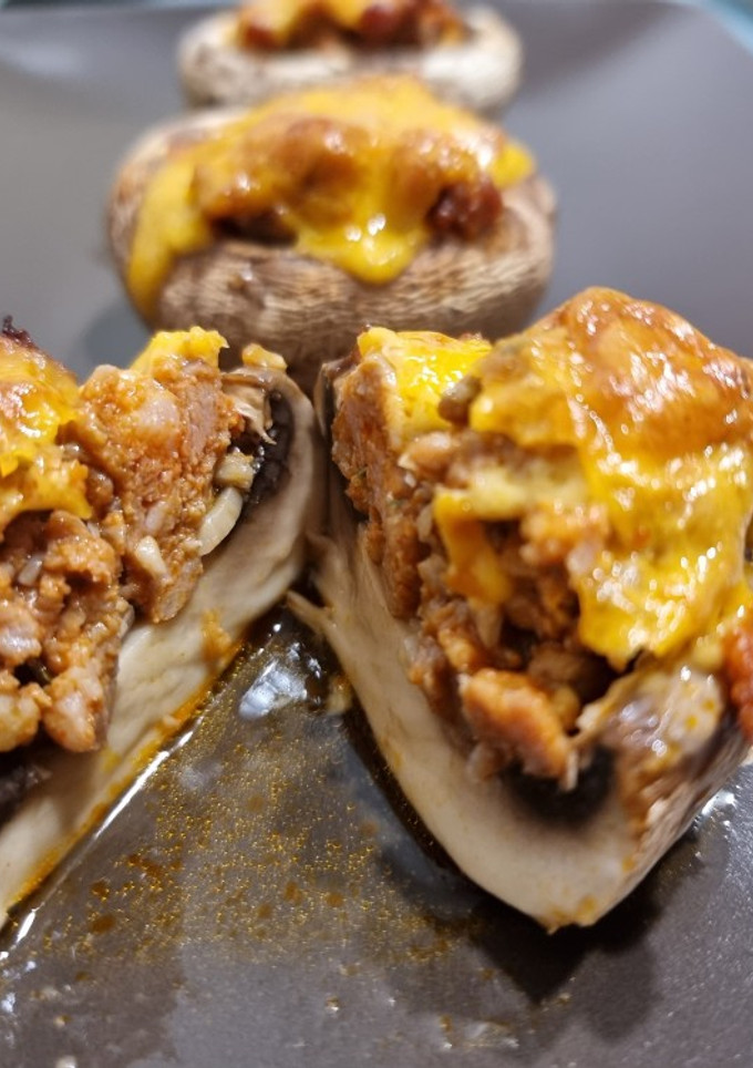 Una foto de Champiñones de picadillo y cheddar