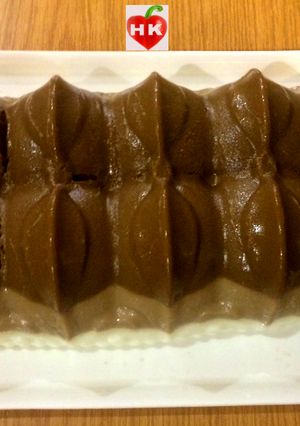 A picture of Coffee and vanilla pudding.
