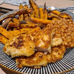 Parmesan & Lemon chicken goujons with sweet potato fries A picture of Parmesan & Lemon chicken goujons with sweet potato fries.