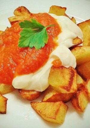 A picture of Patatas Bravas with Two Sauces.