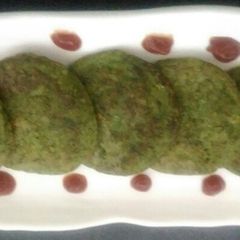 A picture of Sprouted Moong Palak Mini Chila.