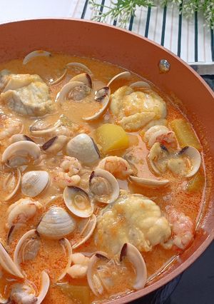 A picture of Monkfish Stew with Shrimp and Clams.