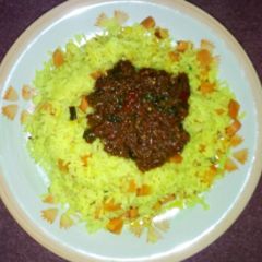 A picture of Turmeric rice and stew.
