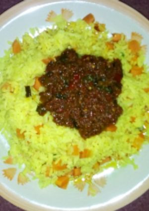 A picture of Turmeric rice and stew.