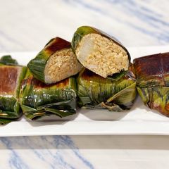 A picture of Lemper Ayam - Steamed Glutinous Rice with Spiced Chicken Floss.