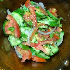 A picture of Cucumber tomatoes 🍅salad.