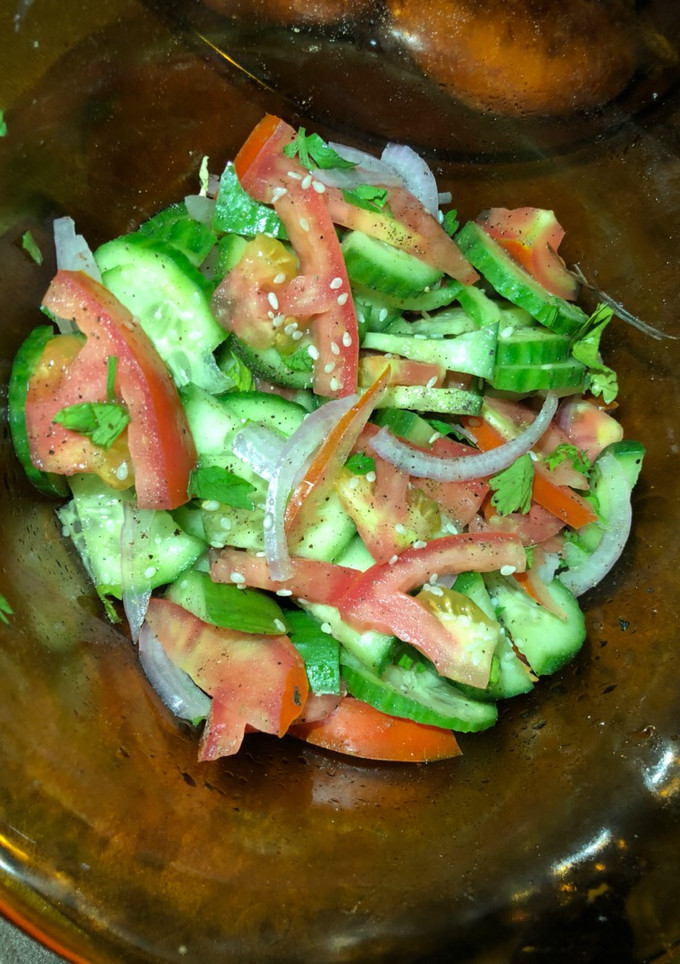 A picture of Cucumber tomatoes 🍅salad.