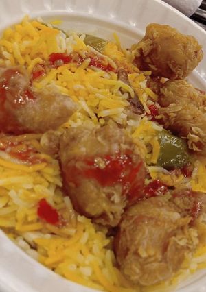 A picture of Rice and spice with tender poops chicken 🐔.
