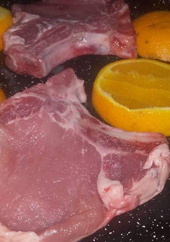Una foto de Cortillas De Cerdo A La Naranja