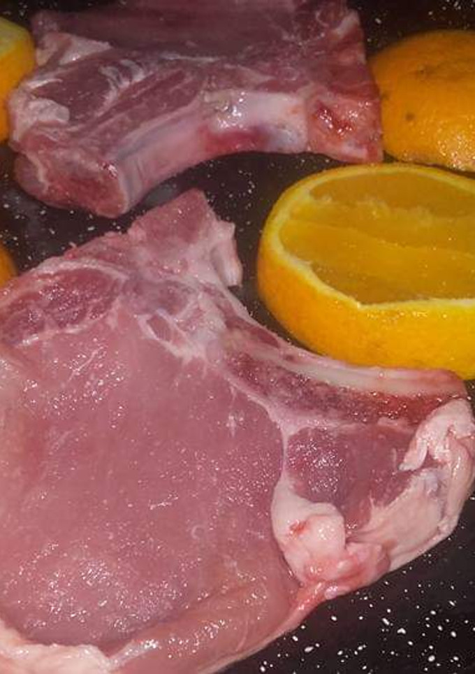Una foto de Cortillas De Cerdo A La Naranja