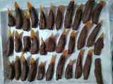 Lenguas de pomelo bañadas en chocolate y mermelada de pomelo