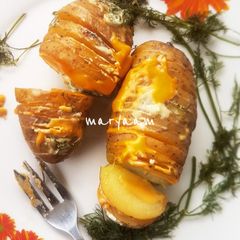 A picture of Cheesy Baked potato.