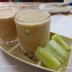 A picture of Masala chaach (Peeled cucumber and peanut).