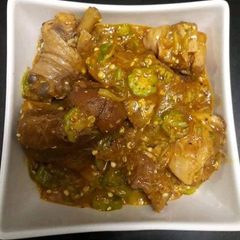 A picture of Okro soup with chicken.