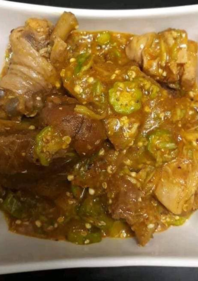 A picture of Okro soup with chicken.