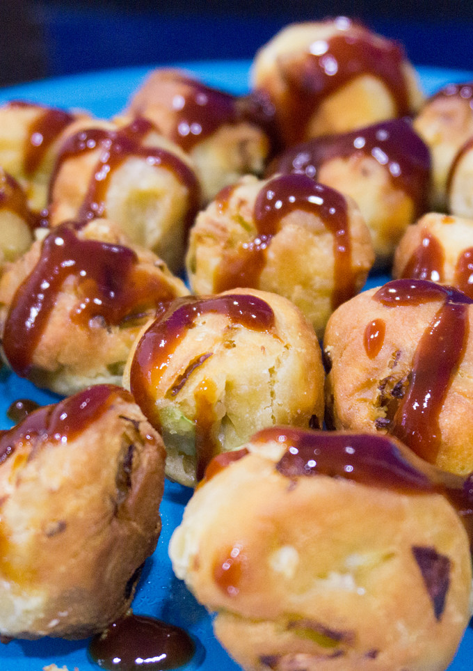 Una foto de Takoyaki de salchichas y queso