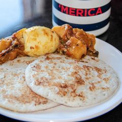 Kallappam & Nadan Mutta Curry- Coconut Pancakes & Egg Curry A picture of Kallappam & Nadan Mutta Curry- Coconut Pancakes & Egg Curry.