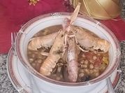 Una foto de cigala con ajo