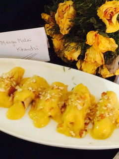 A picture of Mango Malai Sweet Khandvi. .
