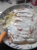 Arroz con leche cremoso con canela y merengue