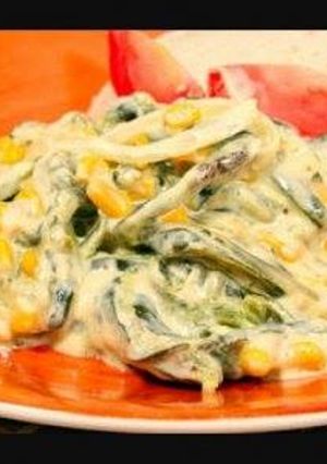 Una foto de Rajas con crema y pollo