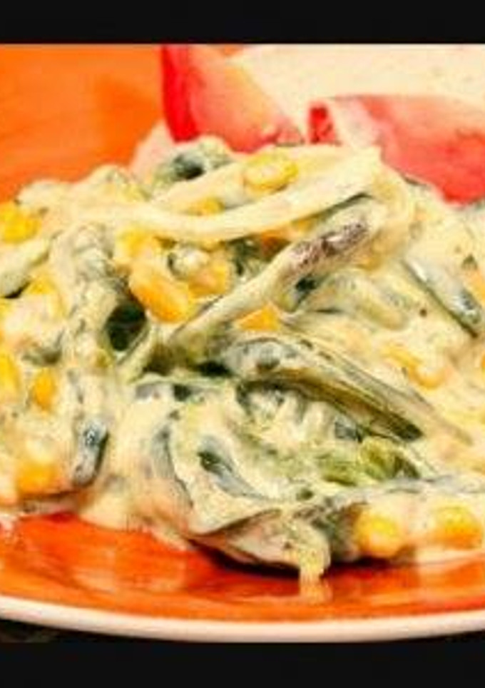 Una foto de Rajas con crema y pollo