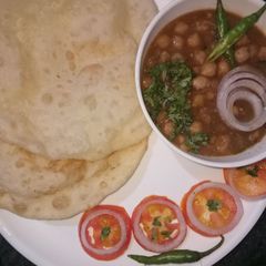 Amritsari Chhola with bhatura A picture of Amritsari Chhola with bhatura.