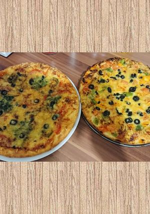 A picture of Chicken tikka pizza.