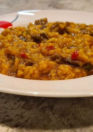 Una foto de Arroz con champiñones y sobras de carrilleras