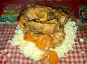 Una foto de ossobuco al vino tinto