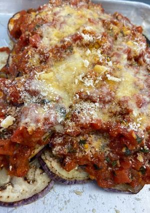 Una foto de Berenjenas parmesanas