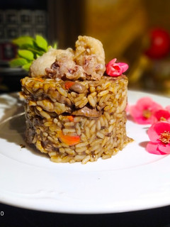 Una foto de Arroz Negro con Chipirones en Olla GM