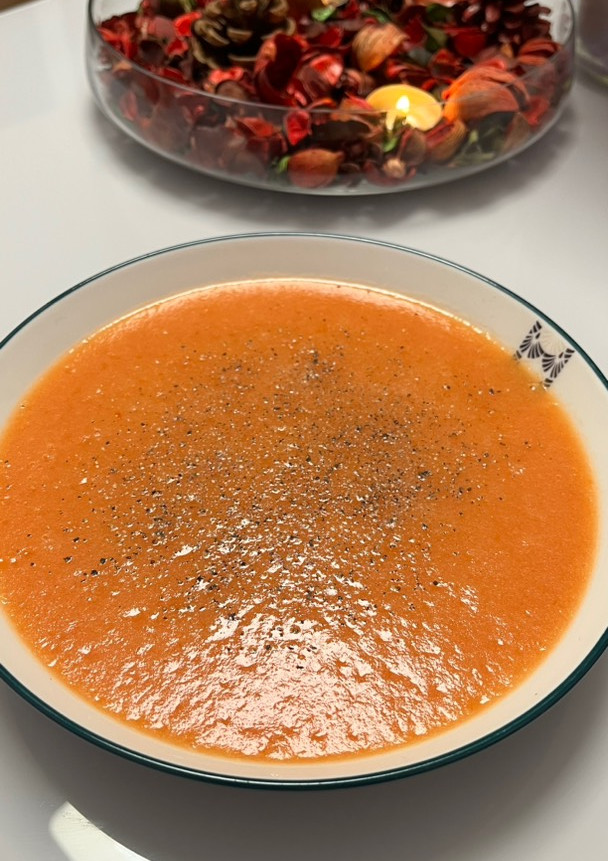 Una foto de Crema de Tomate con Papas