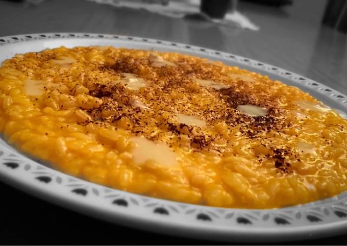 Guida passo passo a Fai Premiato Risotto alla zucca, peperoncino, gorgonzola e cacao amaro 🎃 🌶 🍫